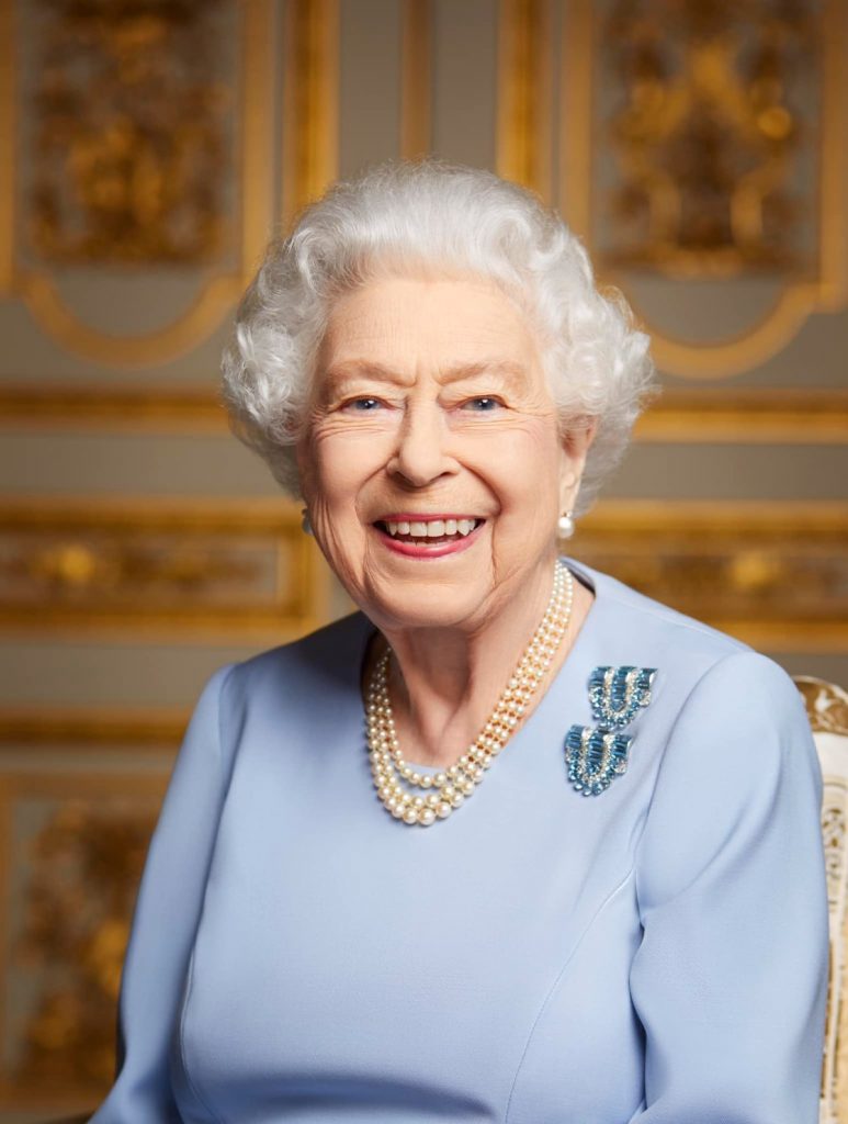 Recent portrait photo of Queen Elizabeth II in pale blue dress